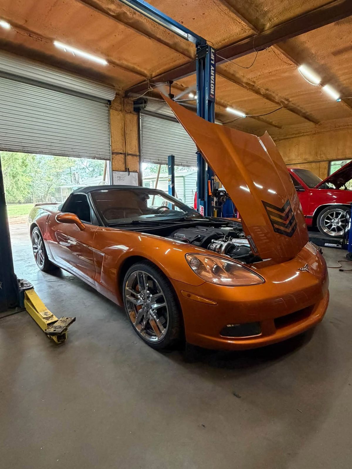Larry’s supercharged 2008 C6 Corvette at Red’s Speed Shop